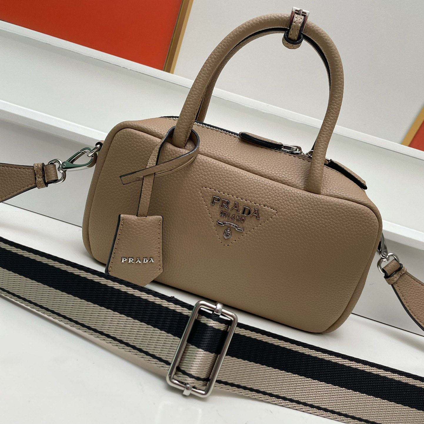 Pra*a top handle bags
